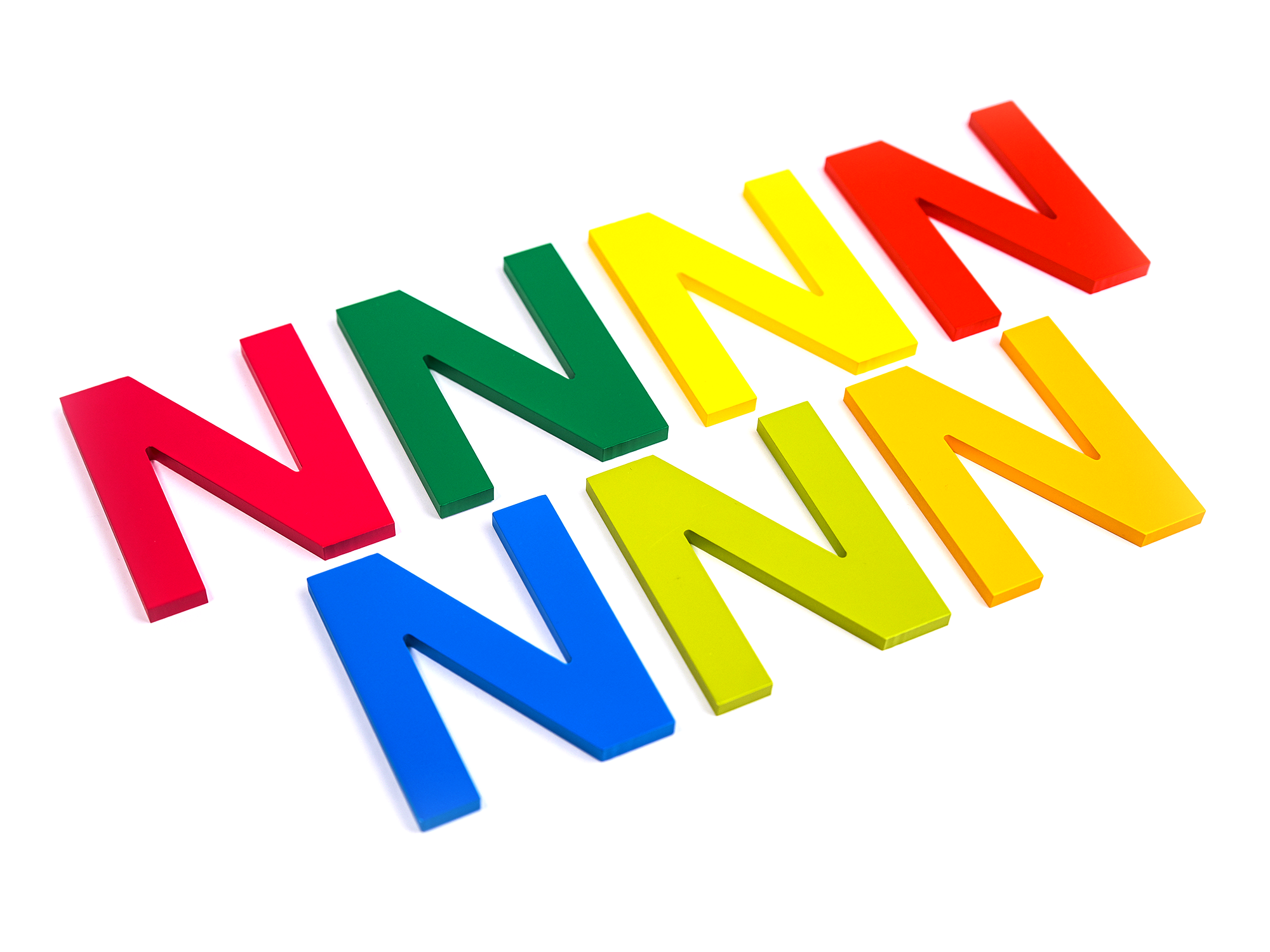 multicolored letter N flat cut acrylic letter sign sample from NOVA Signage sign manufacturer in Canada and USA